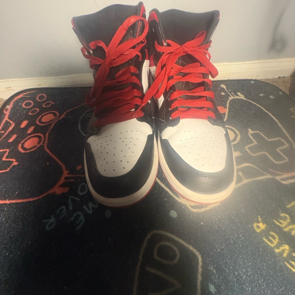 men black red and white high top air jordan 1s
